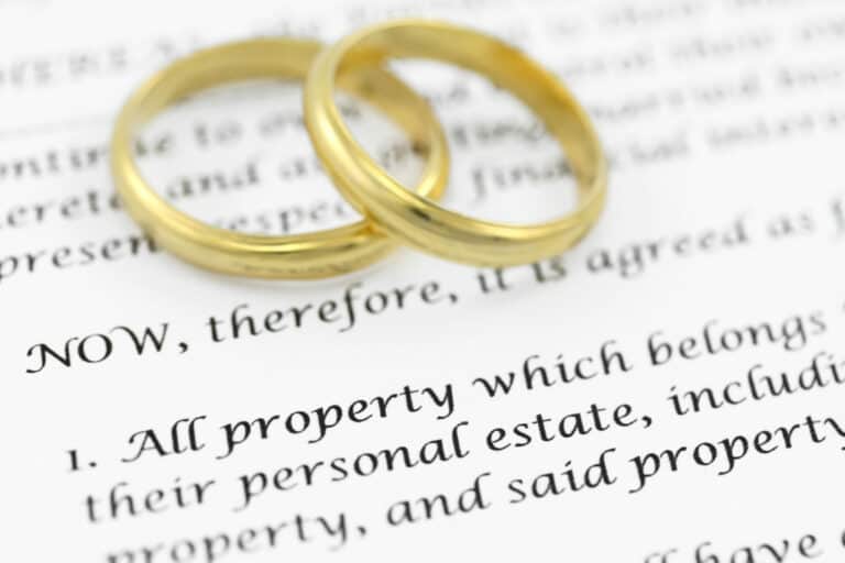 Prenuptial Agreement in Calgary, AB   two wedding bands on a prenup